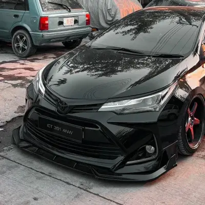 Black Honda Civic RS with custom front bumper, splitter, and LED lights — premium car accessories in Pakistan