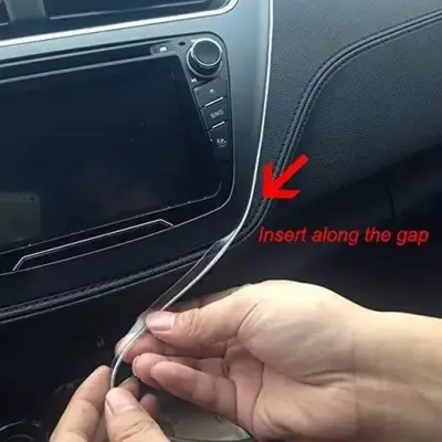 Installing car dashboard trim strip along gap for sleek interior upgrade