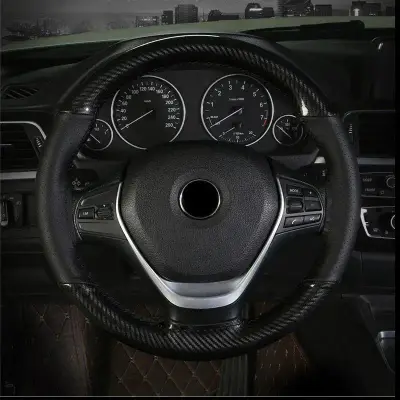 Black carbon fiber steering wheel with perforated leather grip and control buttons for Honda Toyota Suzuki Hyundai